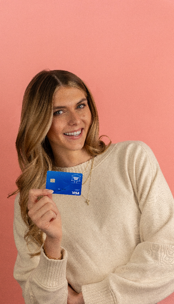 girl holding card